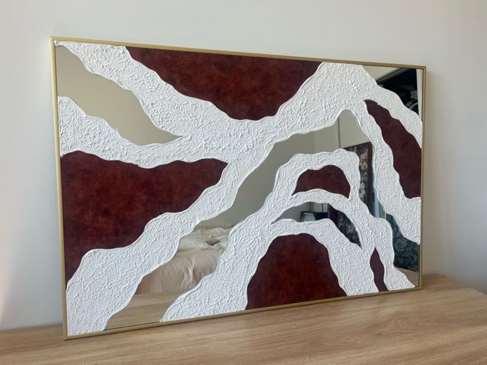 Relief painting by Nate Stegemiller