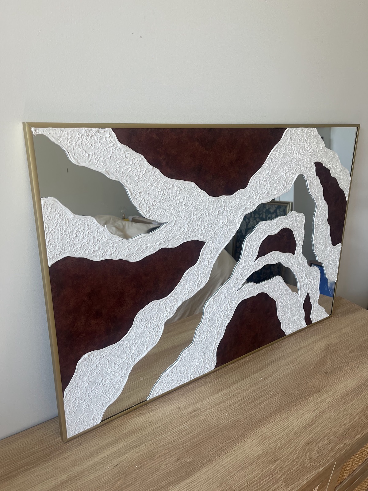 Relief painting by Nate Stegemiller