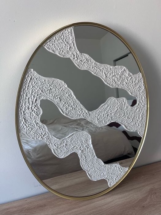 Relief painting by Nate Stegemiller