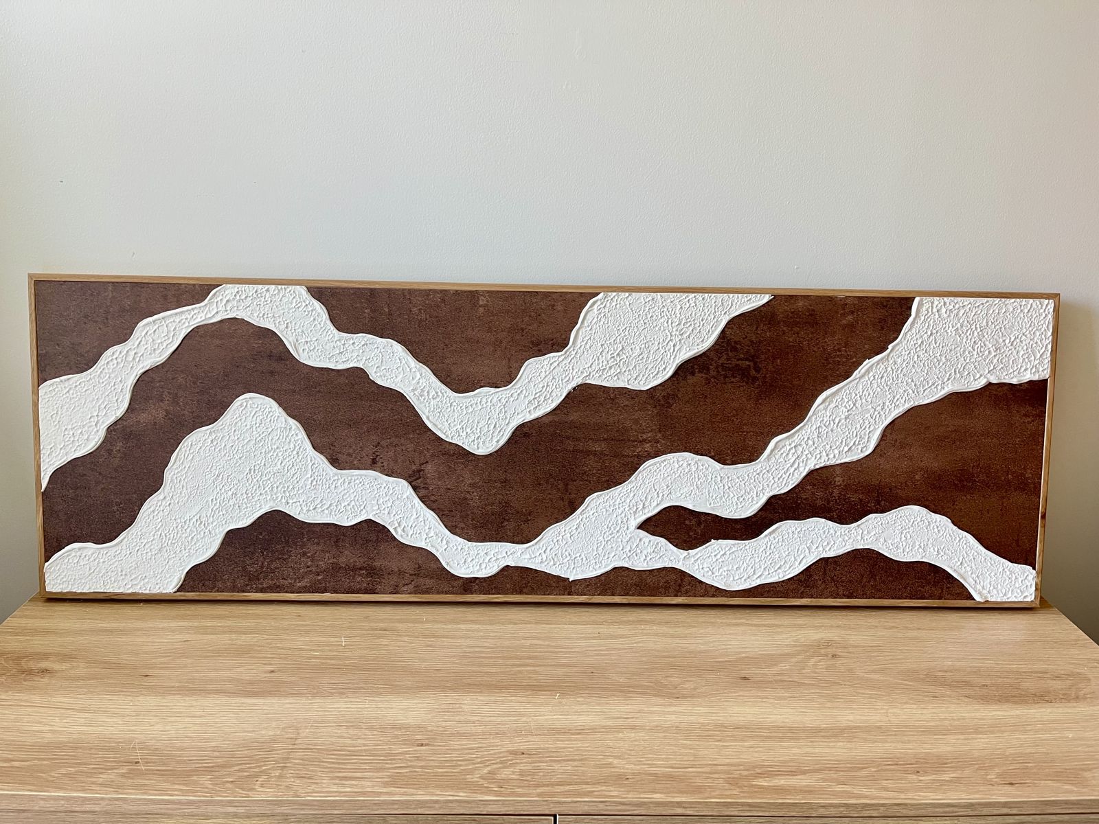 Relief painting by Nate Stegemiller