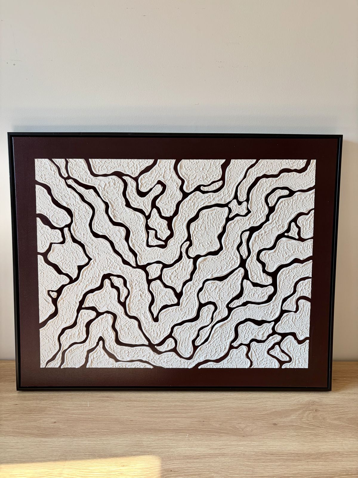 Relief painting by Nate Stegemiller