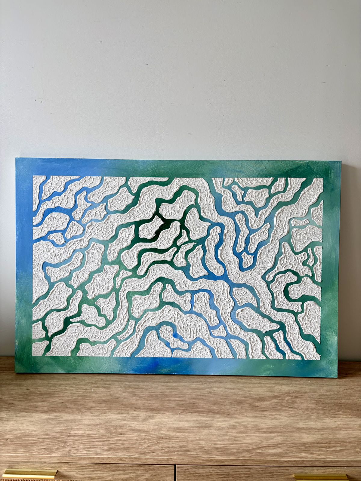 Relief painting by Nate Stegemiller