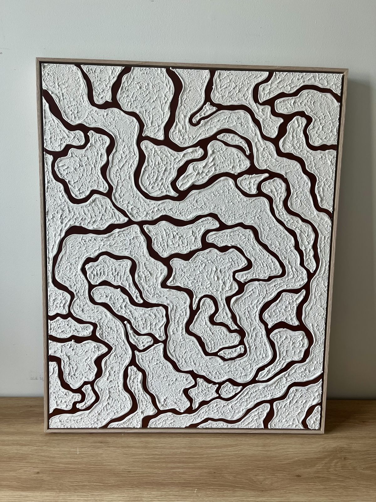 Relief painting by Nate Stegemiller