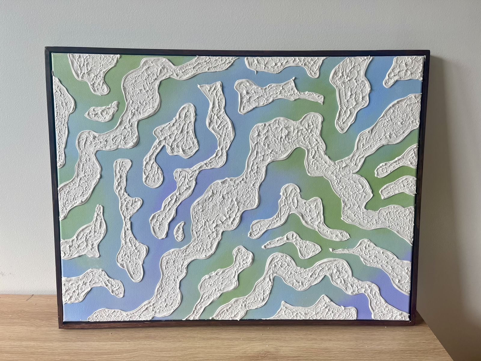 Relief painting by Nate Stegemiller