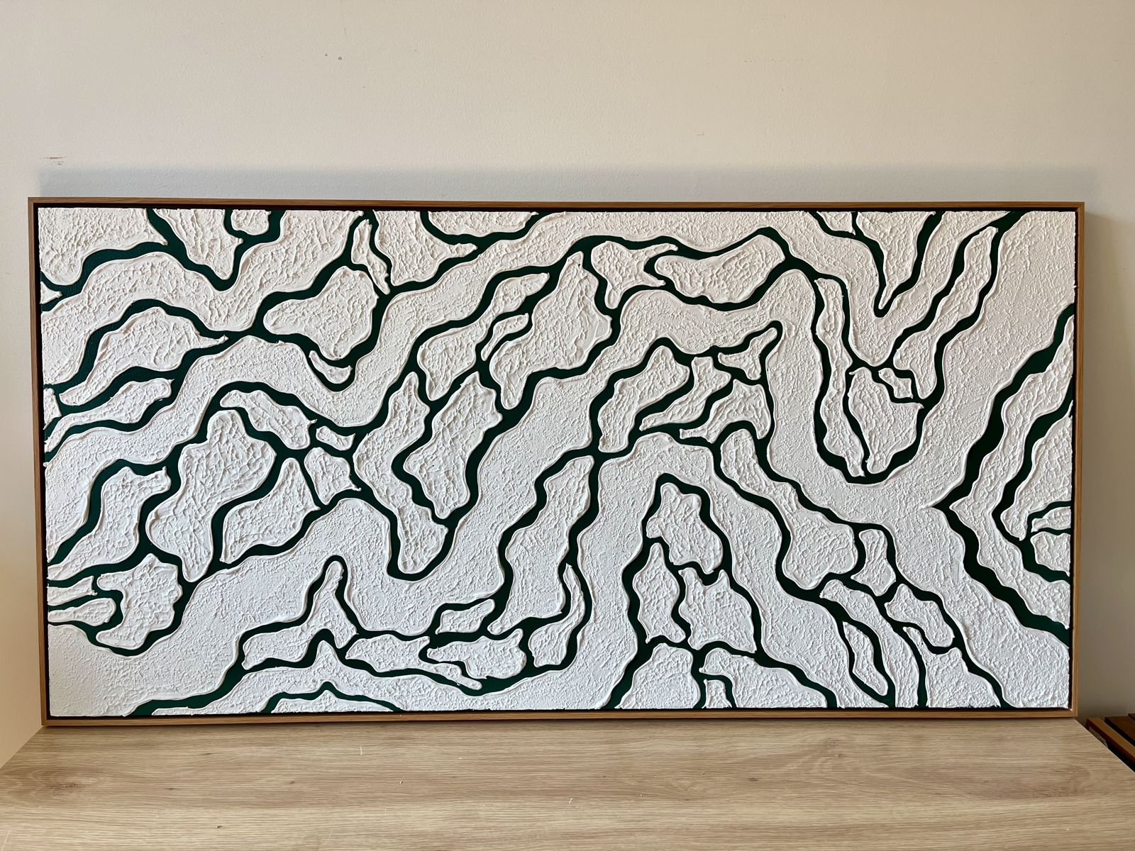 Relief painting by Nate Stegemiller
