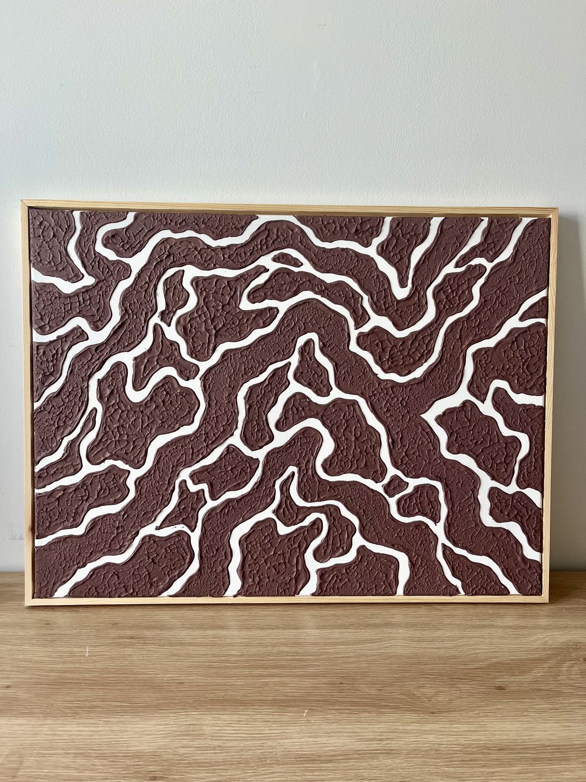 Relief painting by Nate Stegemiller